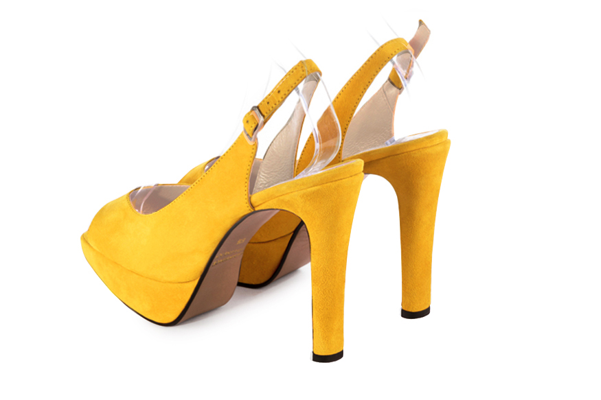 Dress heels peep-toe slingback in yellow leather with high slim heels with a platform at the front and round toe - Rear view